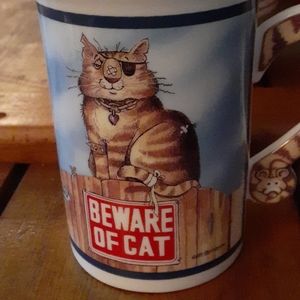 14. Danbury Mint cat cup